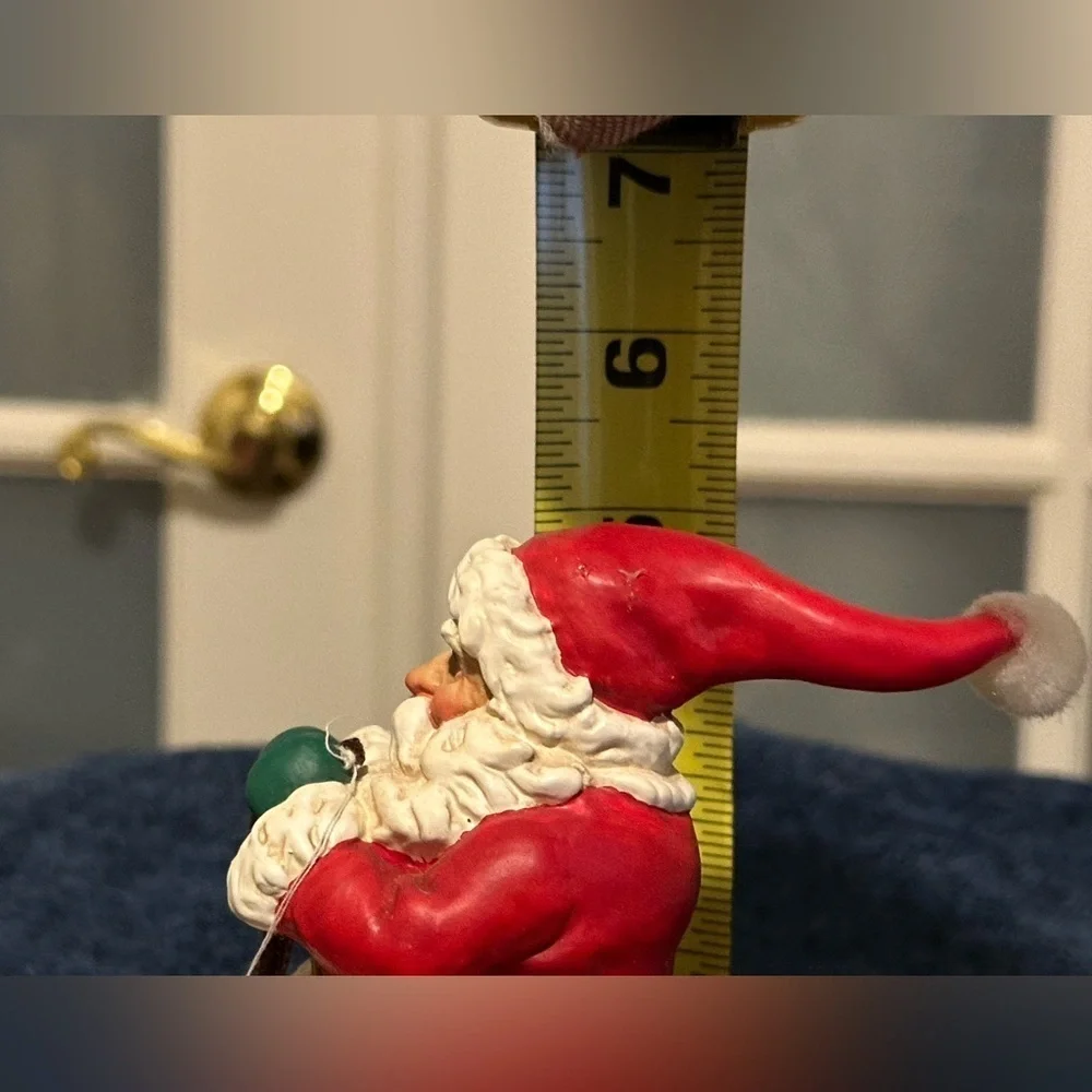 Musical vibrating Santa on his sleigh. Plays 3 songs!